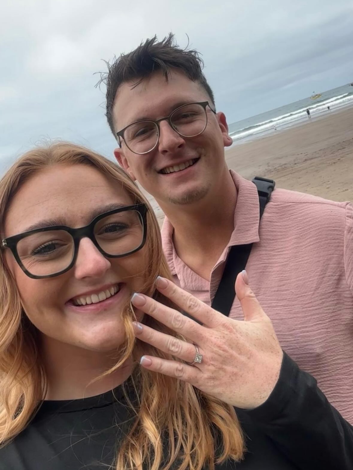 Abbi and Matt celebrating with the ring